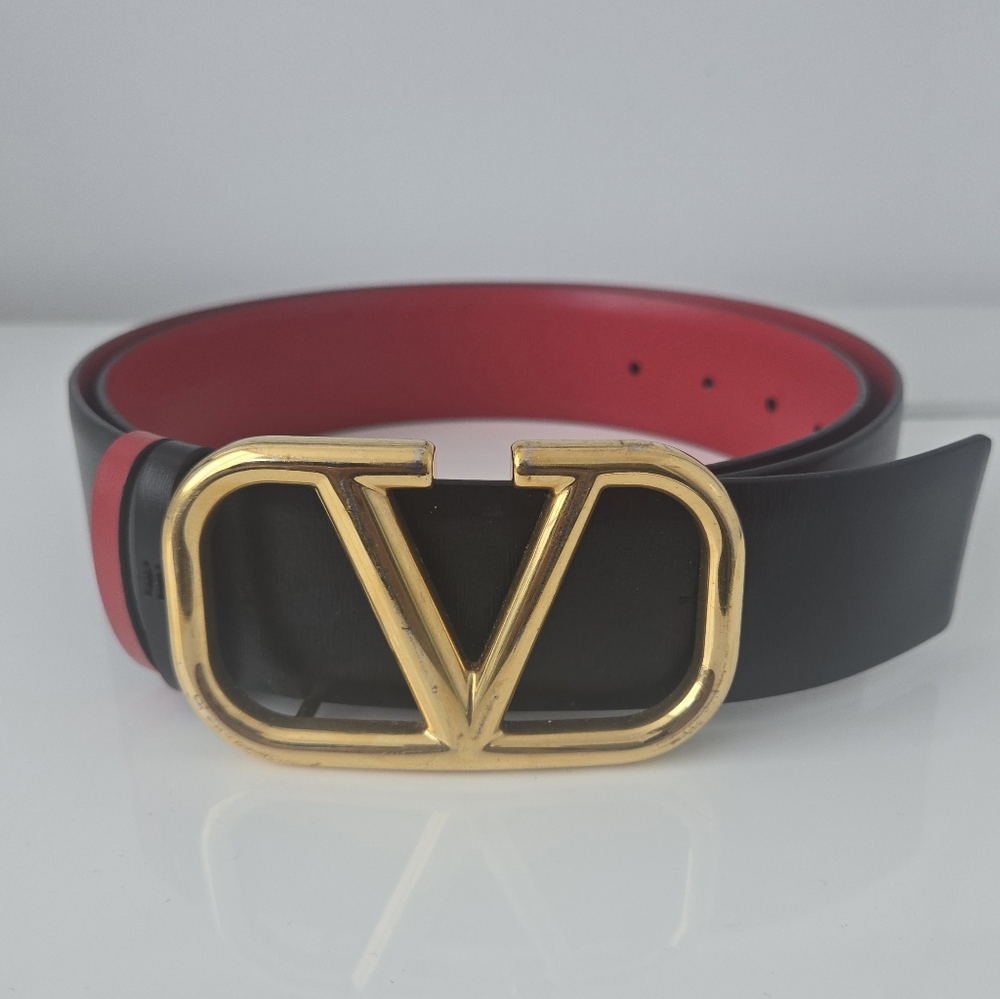 Designer Valentino Authentic Dual-Tone Black and Red Belt with Gold V Buckle.